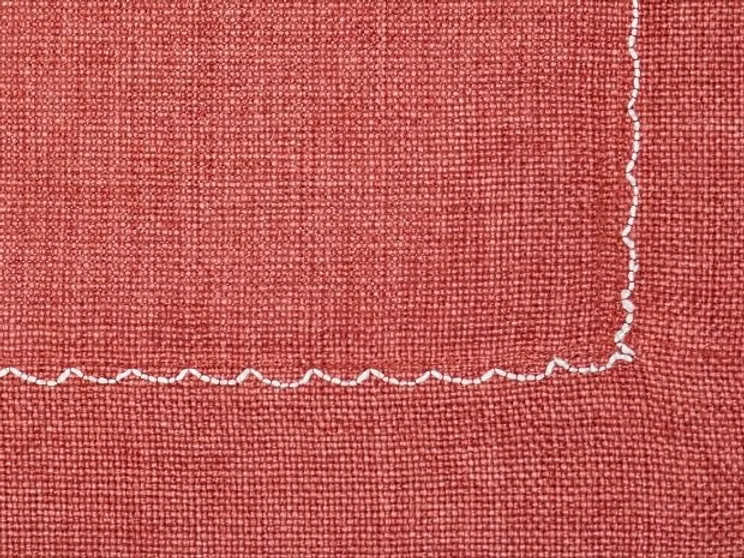 22 Maggio Istanbul Piazza Placemat Set of 4-Close-up of red fabric with a white border