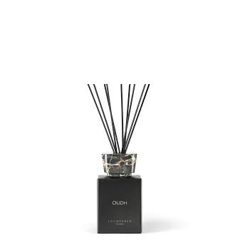 A black Oudh Portoro Cup Diffuser with a clear glass cup on top and a black round base, containing Oudh fragrance oil.