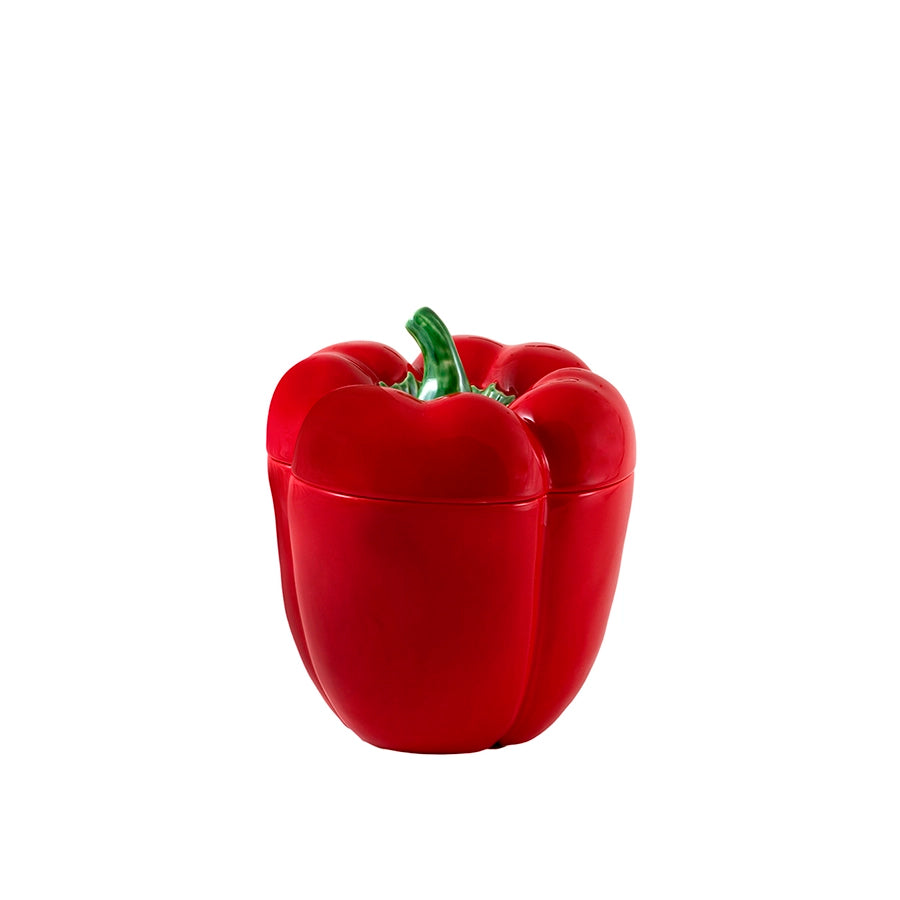 Red pepper-shaped container on a white background