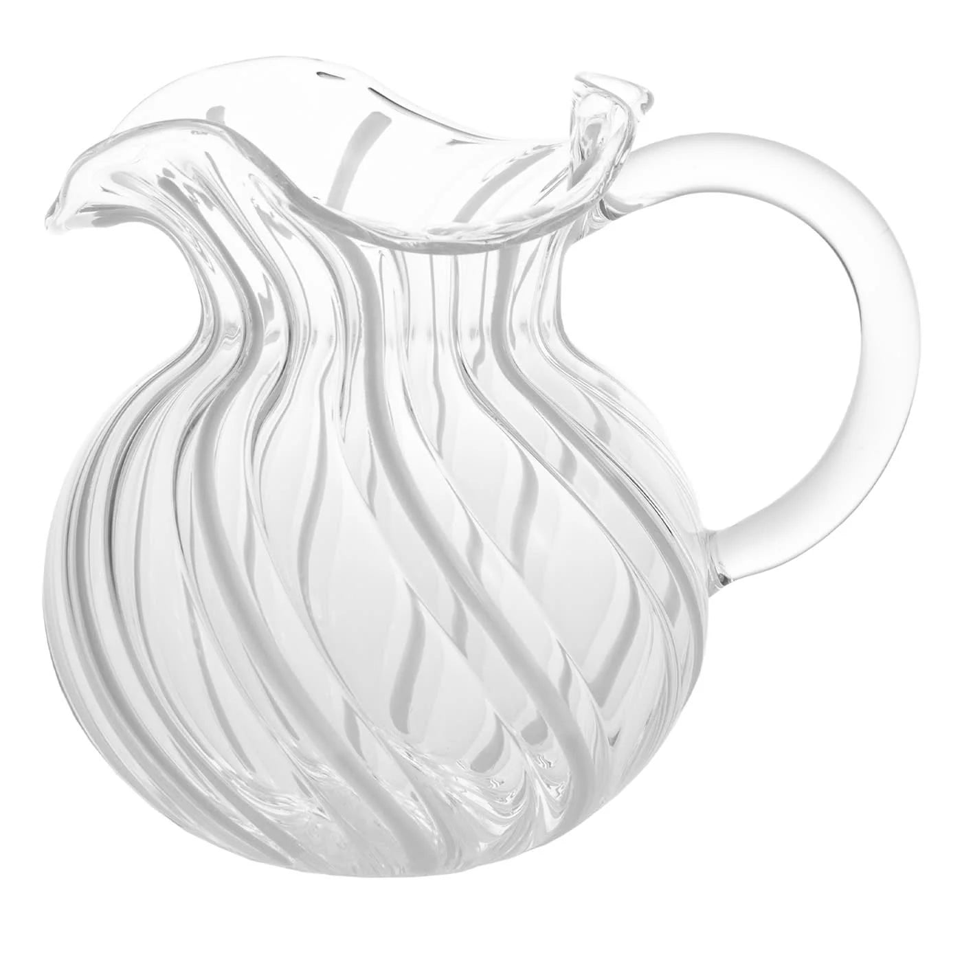 Clear glass pitcher with wavy design on a white background