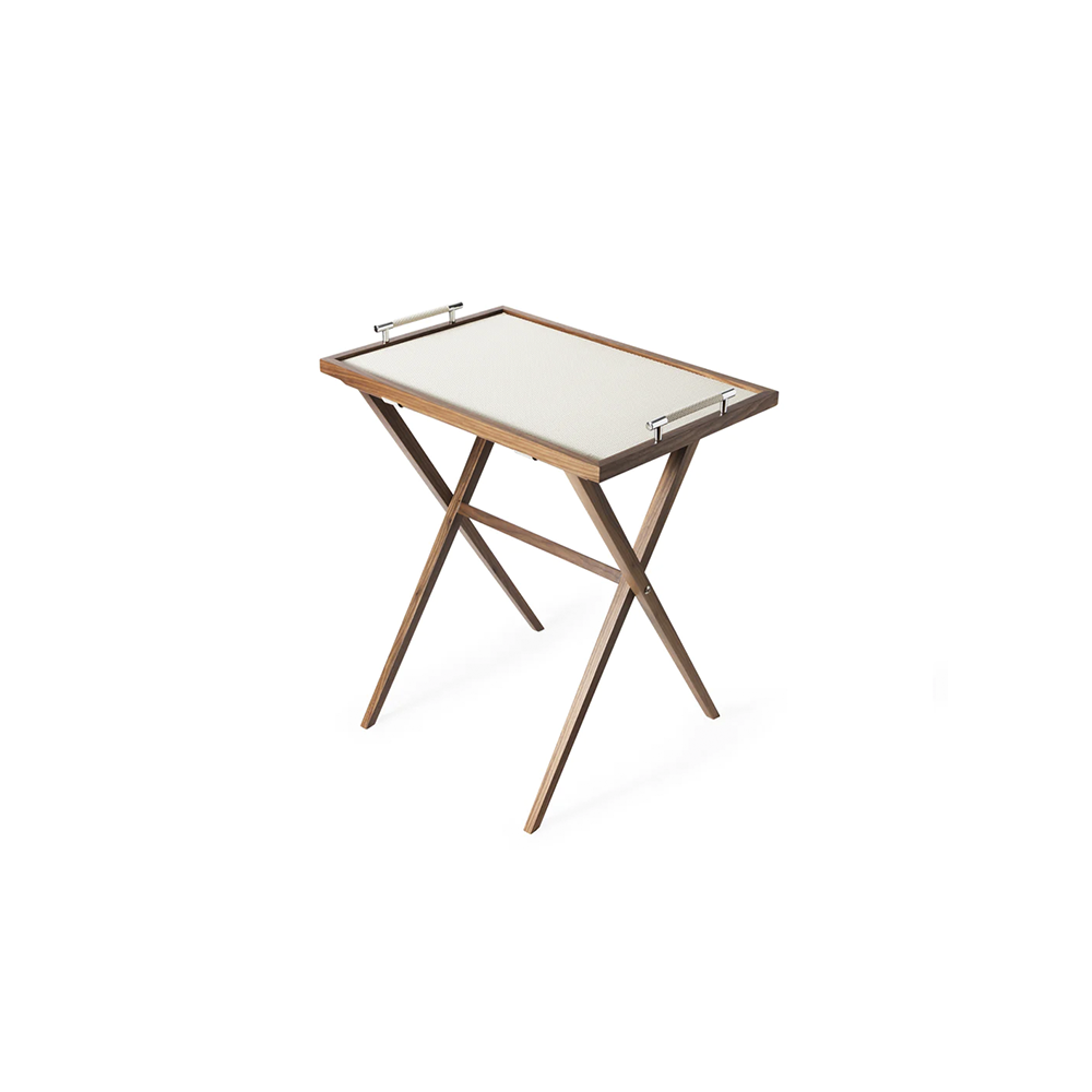 A folding table with a white surface and metallic frame, having oak wood painted in wenge or canaletto walnut, with foldable legs and soft leather surface.