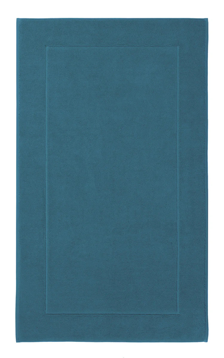 Aquanova London Bath mat-Rectangular blue rug with a plain design on a white background