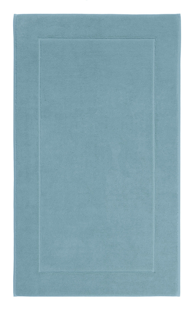 Aquanova London Bath mat-Rectangular blue rug with a plain design on a white background