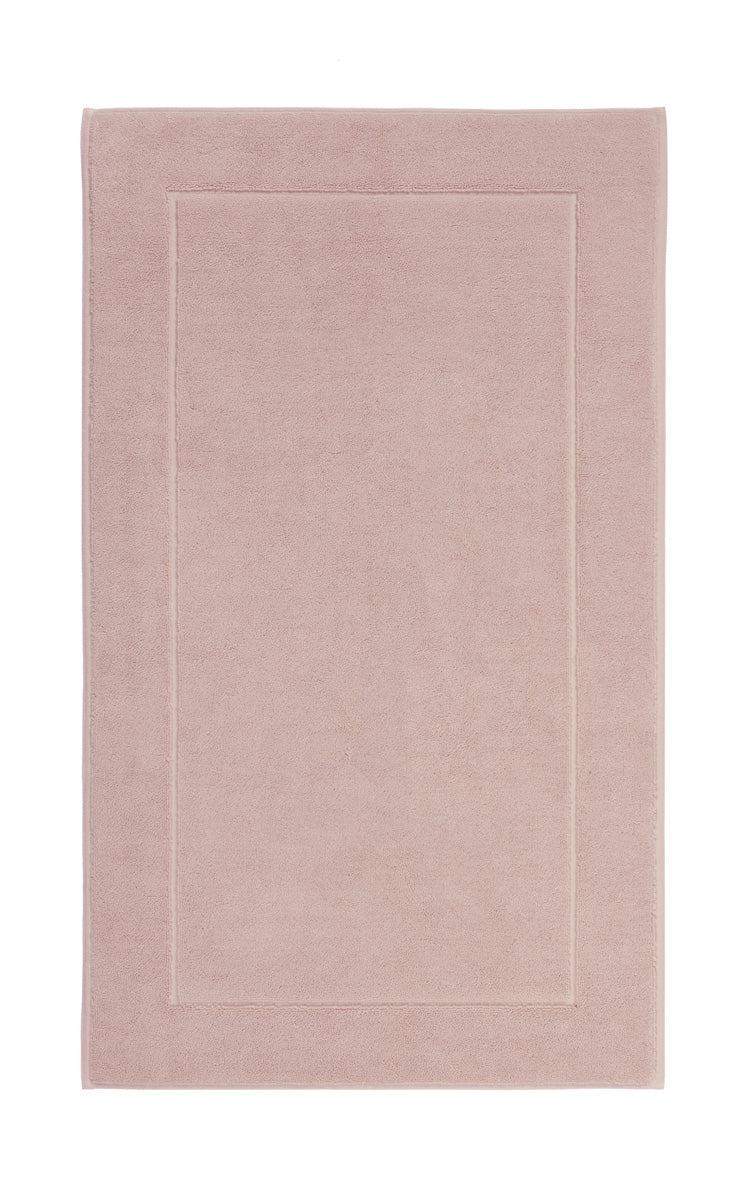 Aquanova London Bath mat-Rectangular pink rug with a border on a white background