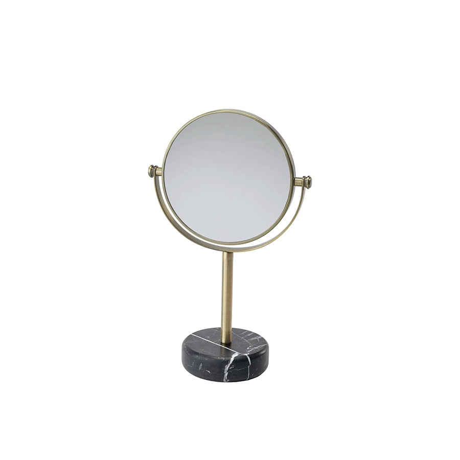Aquanova Nero Mirror-Stand mirror with round reflective surface on a marble base against a white background