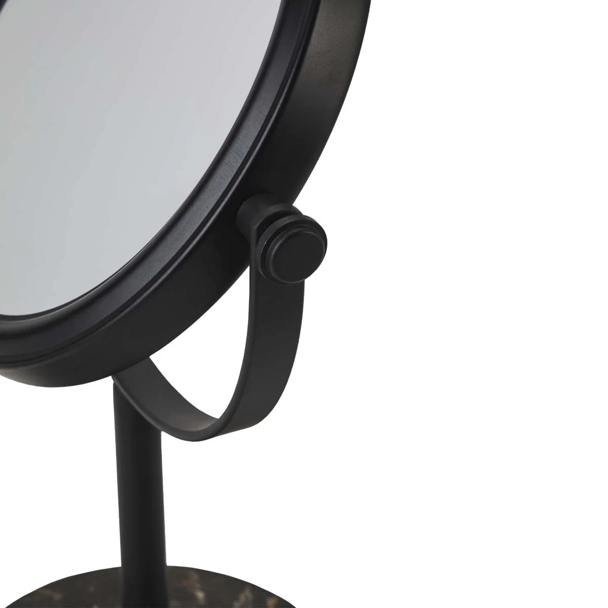 Black makeup mirror with a stand on a white background