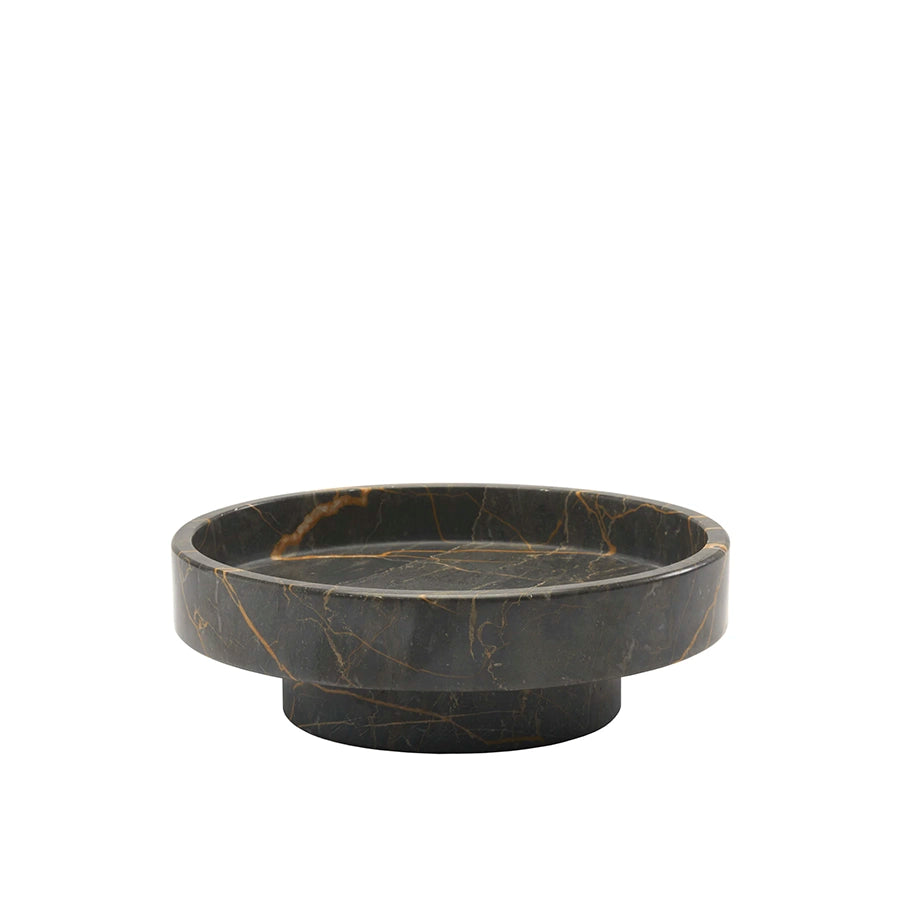 Black marble-patterned dish on a white background
