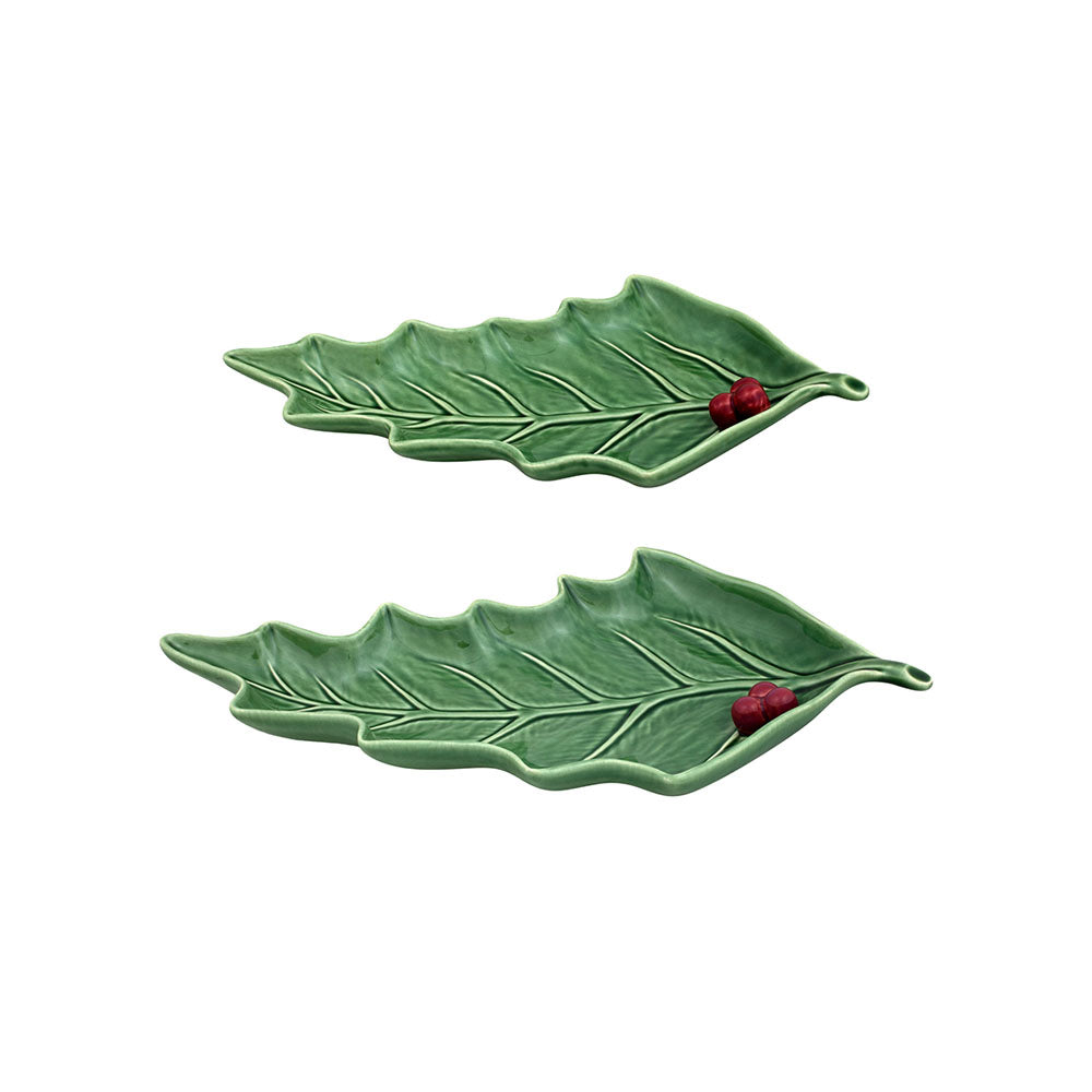 Bordallo Pinheiro Holly Leaf Platter-Two green leaf-shaped ceramic dishes with red berries on a white background
