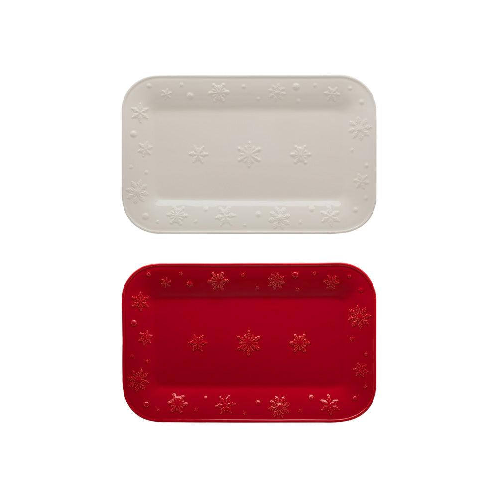 Bordallo Pinheiro Snowflakes Platter-Two rectangular trays, one beige and one red, with snowflake patterns on a white background.