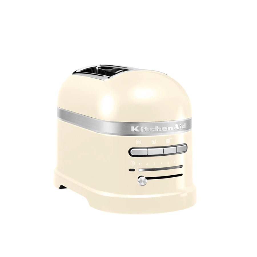 Cream-colored Bread toaster with 'KitchenAid' branding on a white background