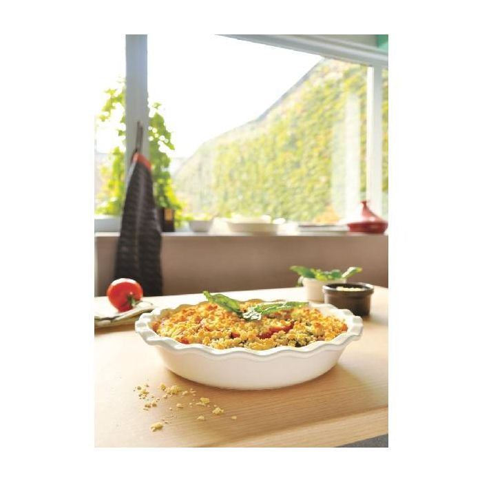 Emile Henry Pie Dish, 26cm-Bowl of food on a table with a window in the background