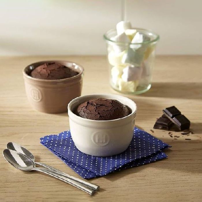 Emile Henry Ramekins, Set of 2-Two ramekins with chocolate desserts on a wooden table with marshmallows and chocolate pieces.