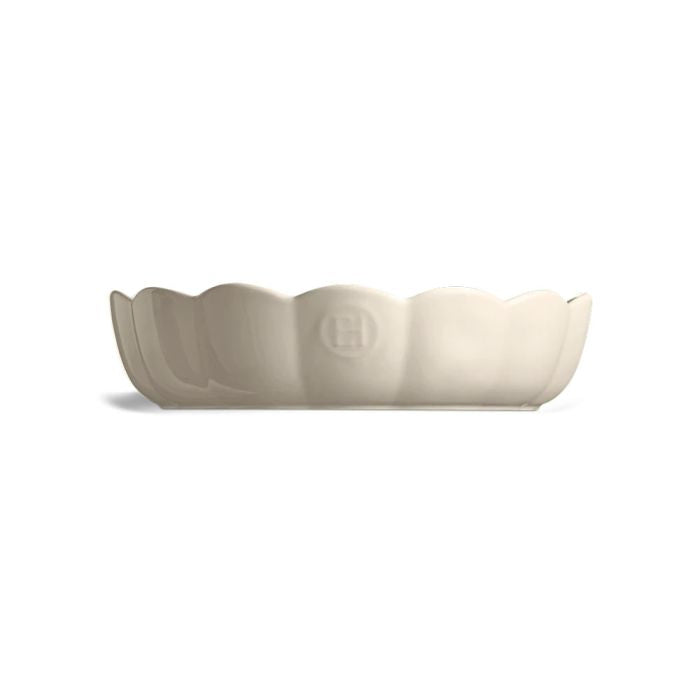Emile Henry Round Cake Dish-White ceramic bowl with scalloped edge on a white background