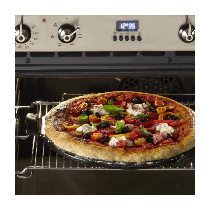 Emile Henry Smooth Pizza Stone, 36cm-Pizza baking inside an oven with a digital clock displaying the time.