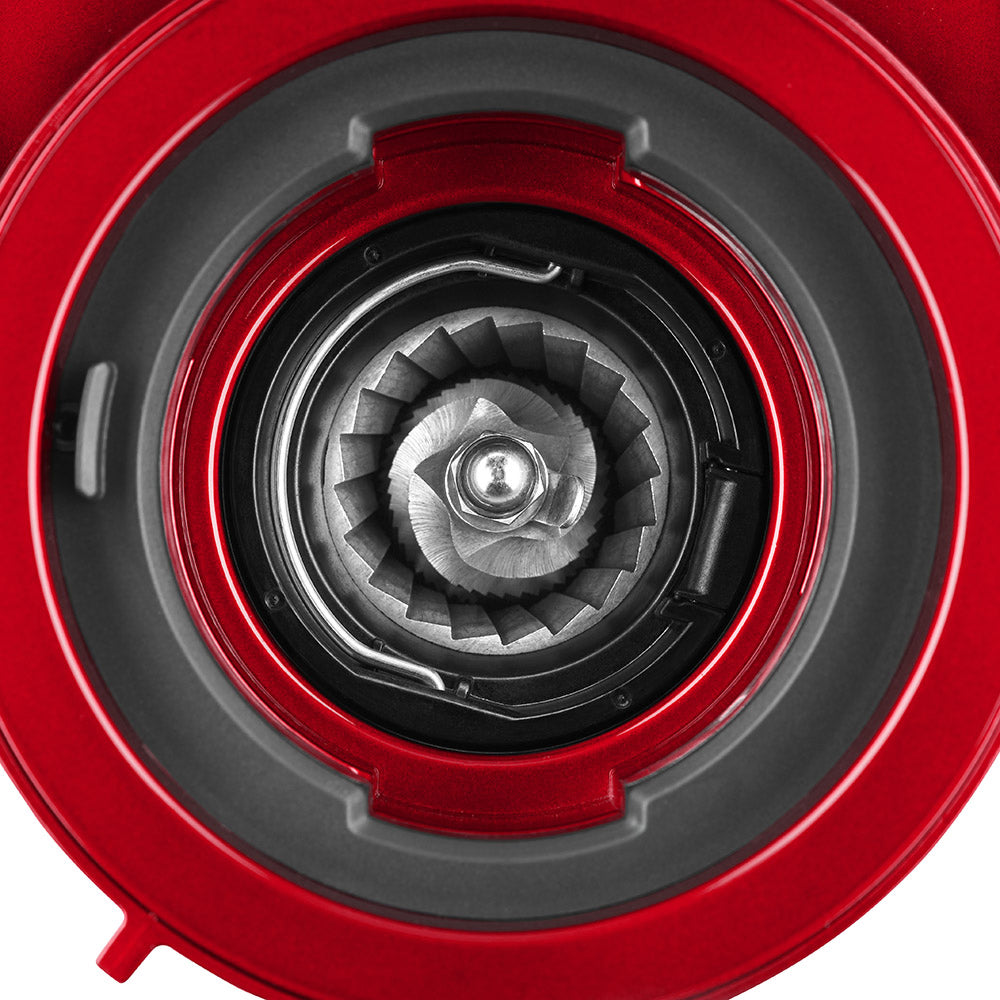 Close-up of a red and black mechanical component, likely a part of a vehicle or machinery.