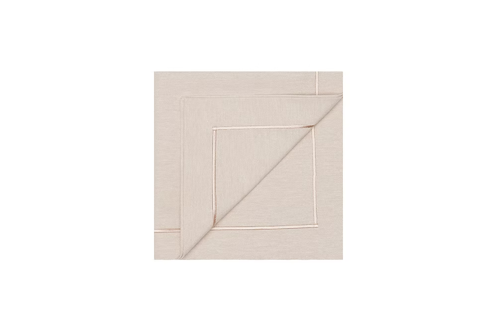 Latte Dinner Napkin Set of 4-Beige fabric swatch with a subtle pattern on a white background