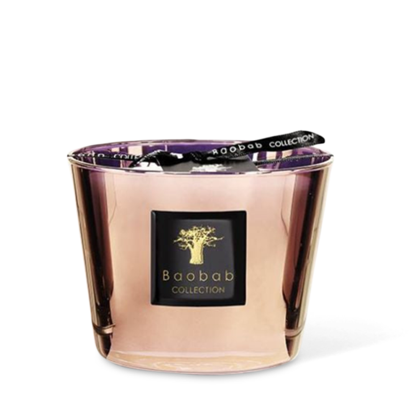 A clear glass candle with a copper alloy cover featuring the Baobab Collection logo and a tree design.