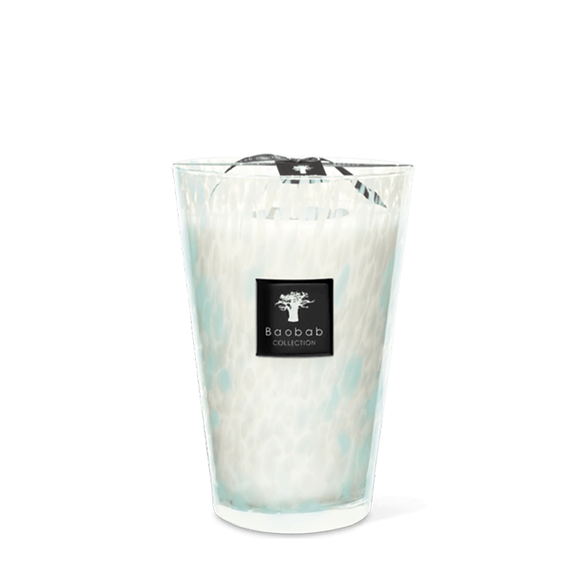 A clear hand-blown glass candle with azure inlays and a black label with the brand name 'Baobab Collection'.