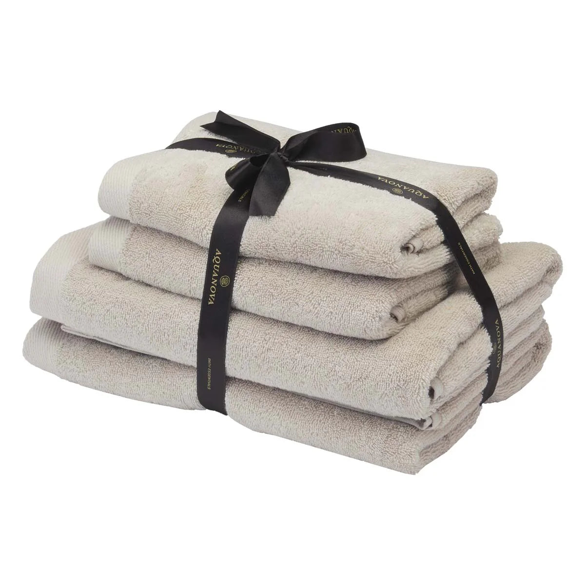 Stack of folded towels tied with a black ribbon on a white background