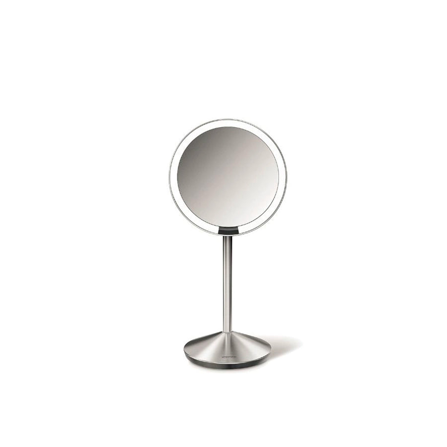 Simplehuman Sensor Mirror Fold with Travel Case-Round makeup mirror on a stand with a white background