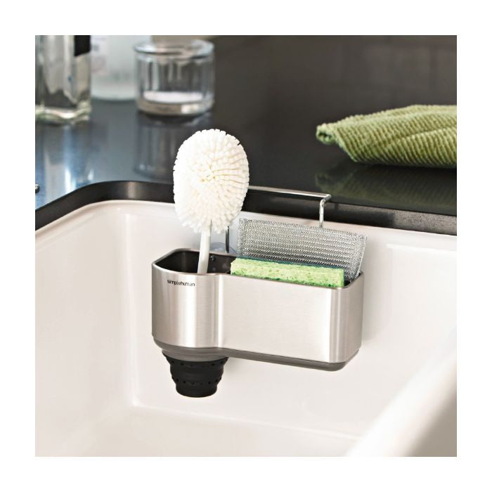 Simplehuman Sink Caddy-Sink caddy with cleaning brush and sponge holder on a kitchen counter.