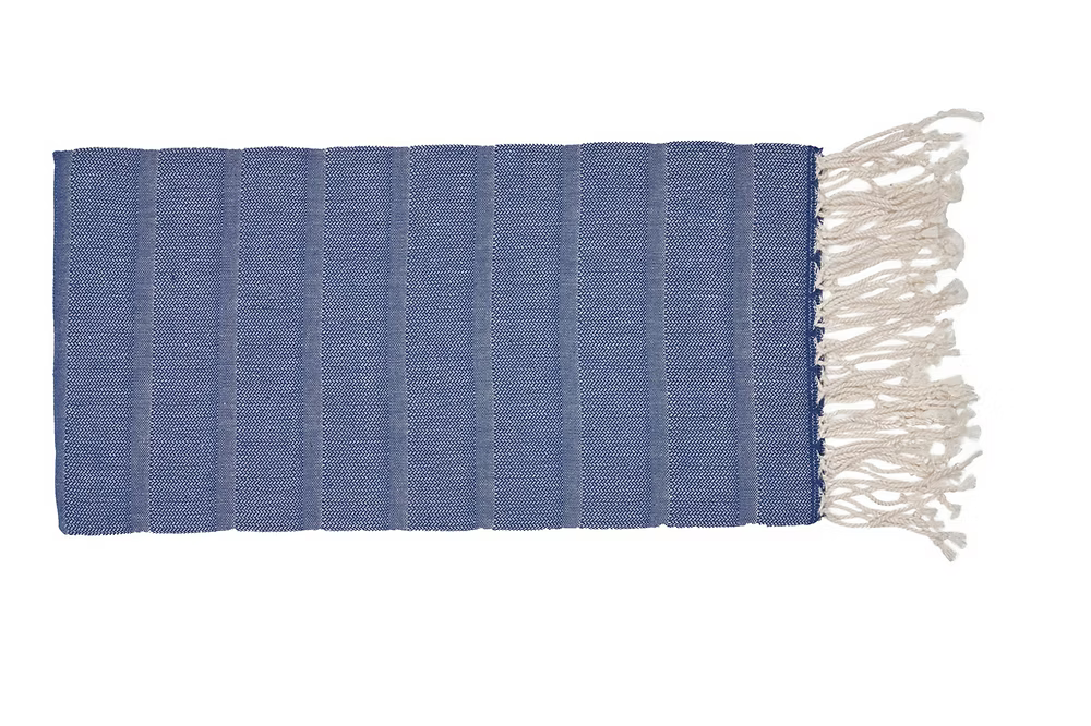 Sole Beach Towel (Navy)-Blue woven mat with white fringe on a white background