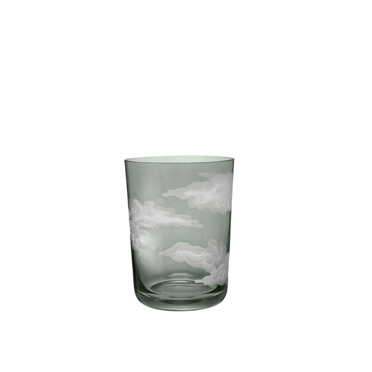 Glass tumbler with cloud design on a white background