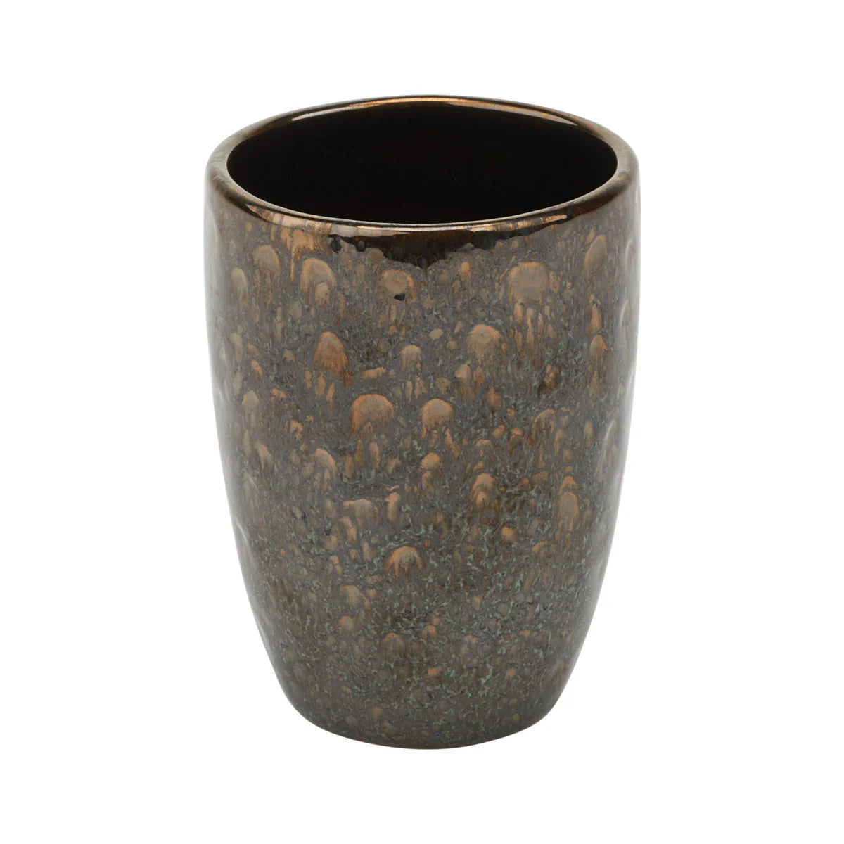 Ceramic tumbler with speckled design on a white background
