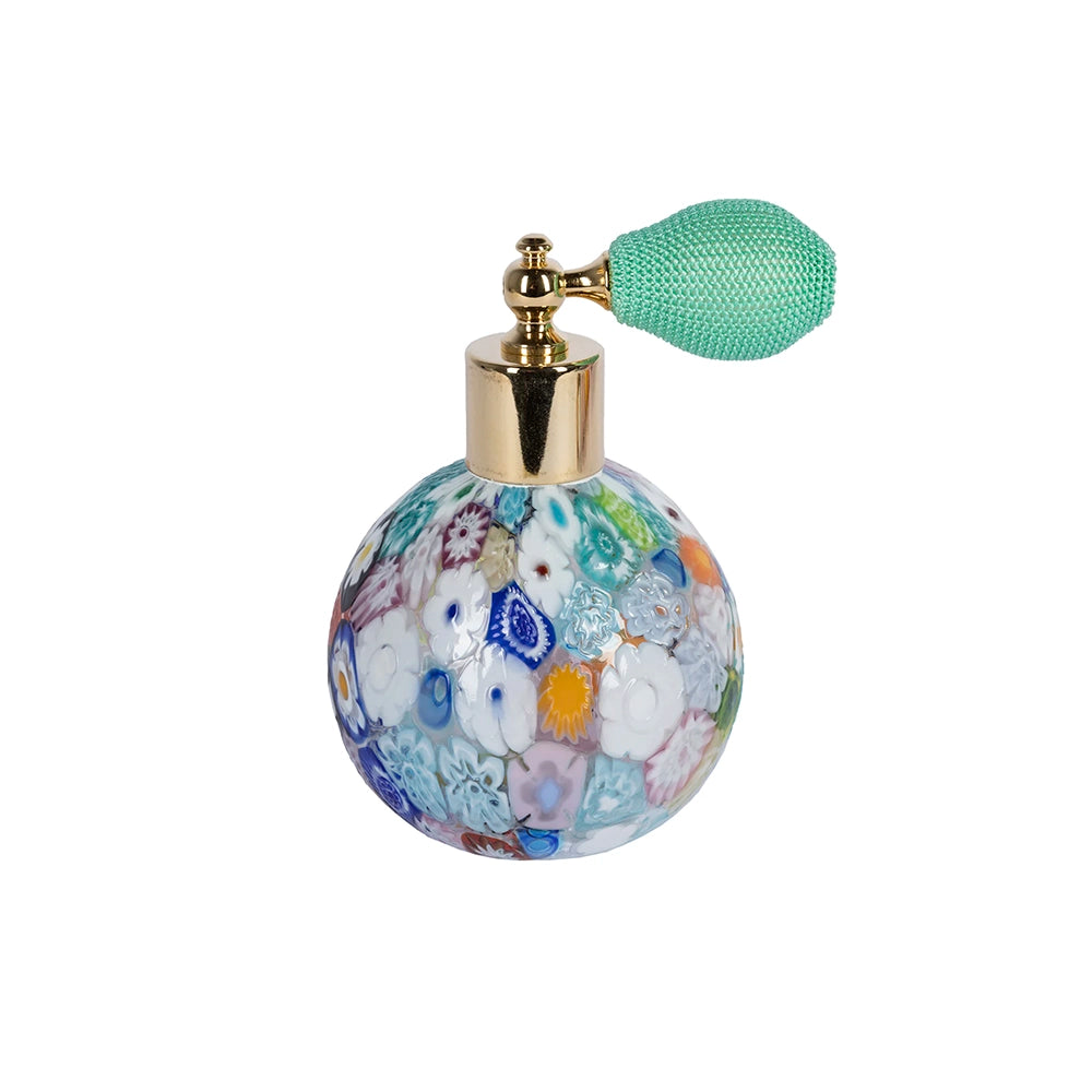 A round multicolored Murano glass perfume bottle with a green glass atomizer.