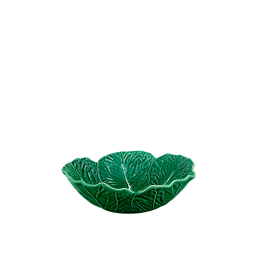Green ceramic leaf-shaped bowl on a white background