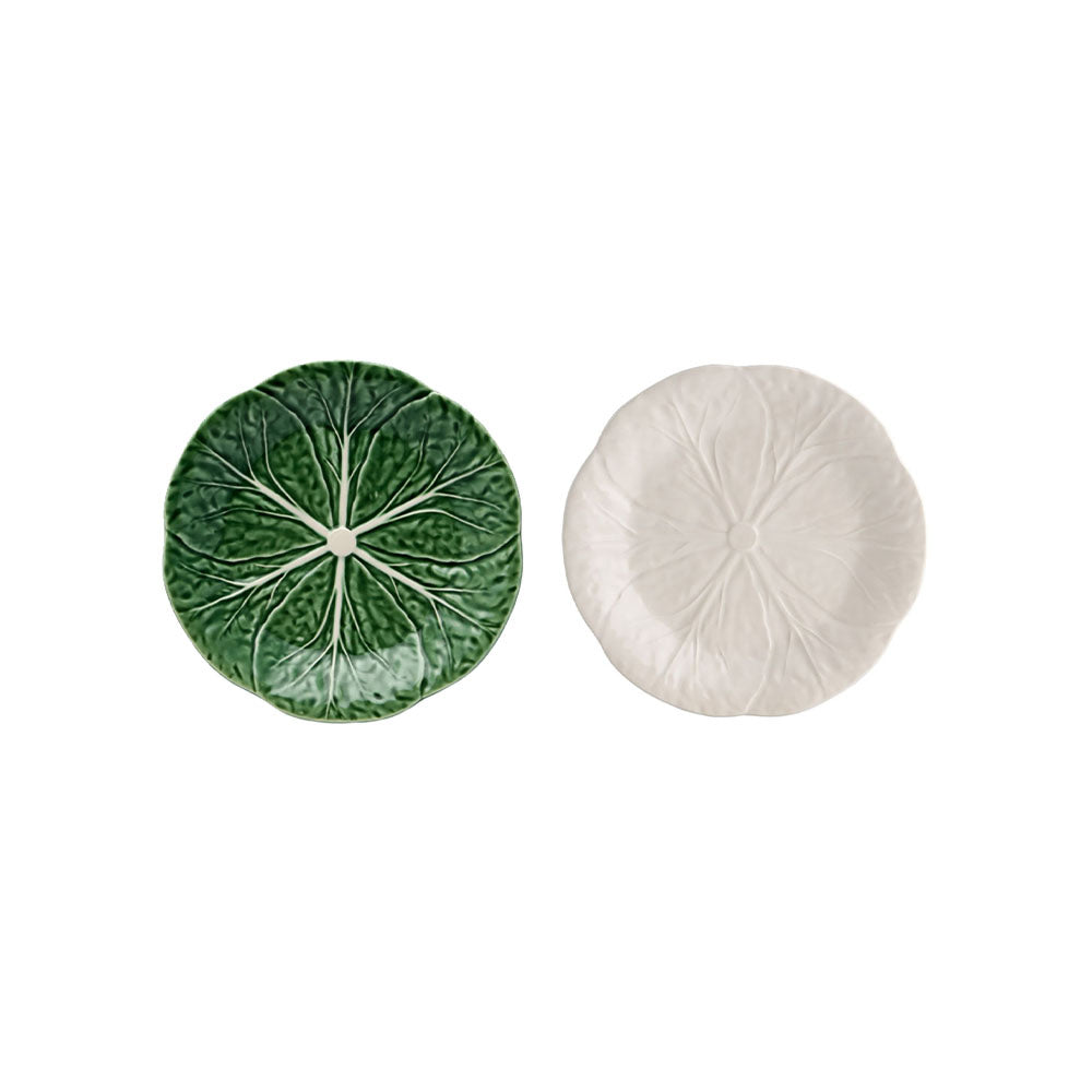 Two round ceramic coasters, one green and one white, on a white background.