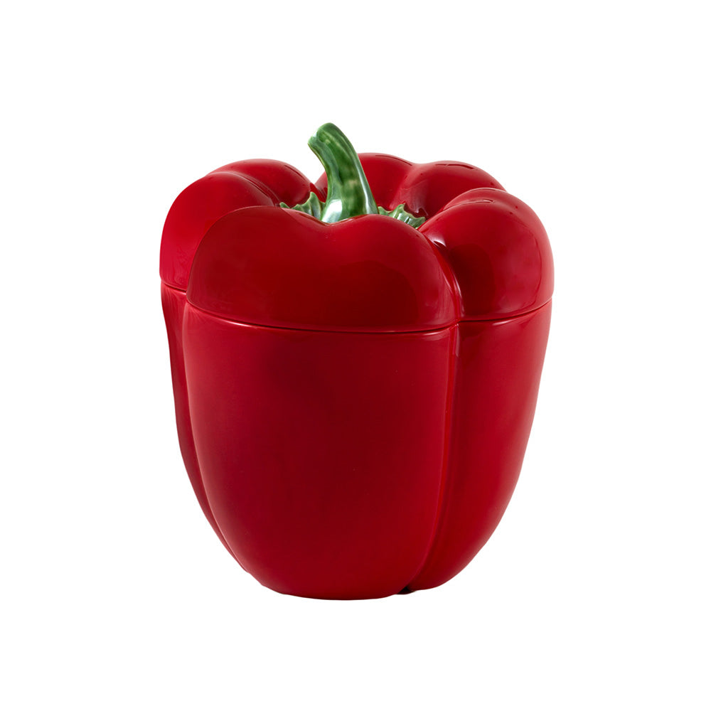 Red pepper-shaped container on a white background