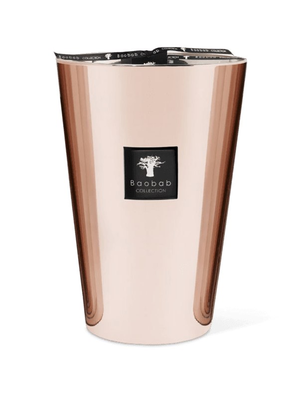 A cylindrical metallic pink glass candle with a logo of a tree on it, from the Baobab Collection.