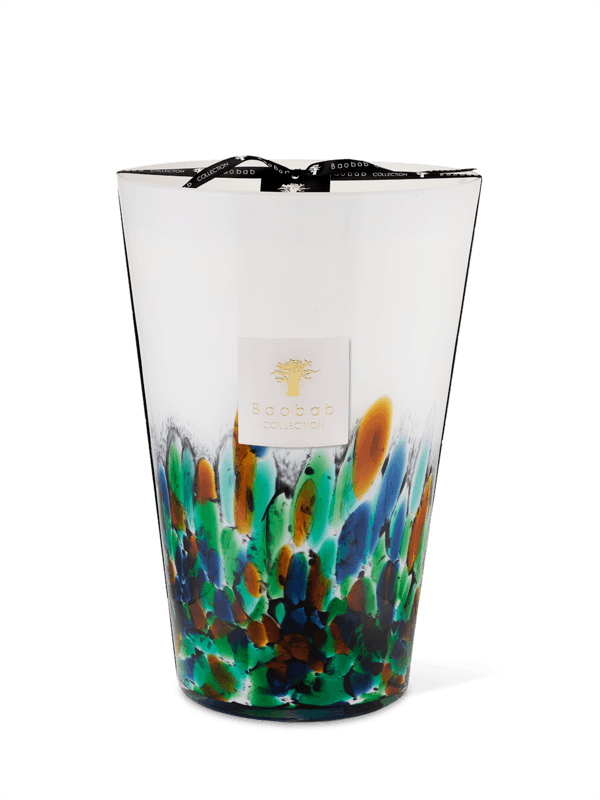 A clear hand-blown opaline glass candle with turquoise, blue, and brown glass confetti, and the brand 'Baobab Collection' visible.