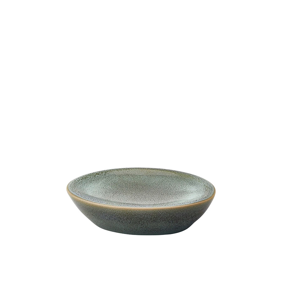 Green ceramic bowl on a white background