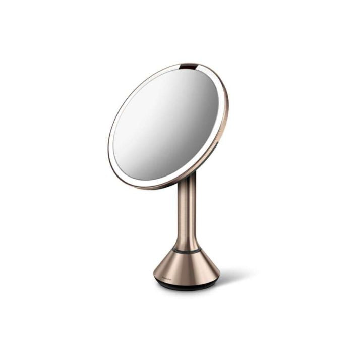 simplehuman Round Sensor Mirror Makeup mirror with a stand on a white backgrounddresser-with-mirror-uae-beauty-lounge-dressing-table-mirror-dubai-luxury-vanity-wall-mirror-for-dubai-bedrooms