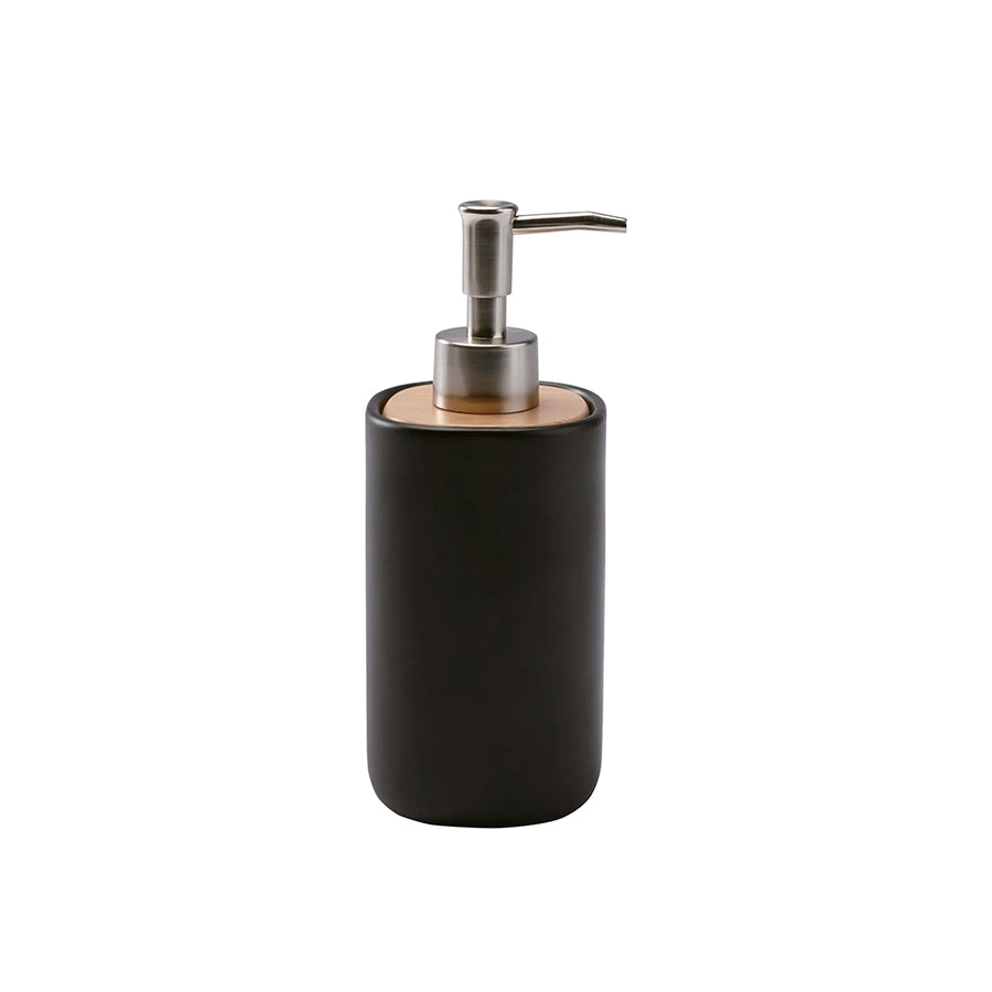 Black soap dispenser with wooden base and silver pump on a white background