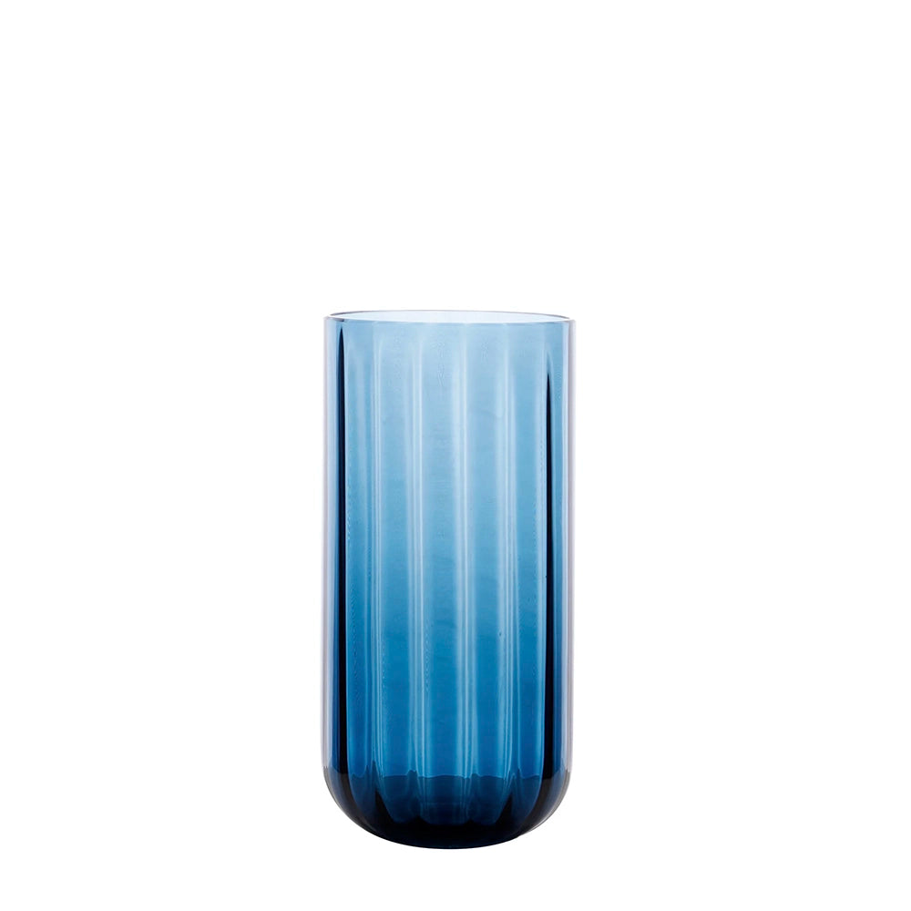 A tall, slender, midnight-blue glass vase with a ribbed texture.