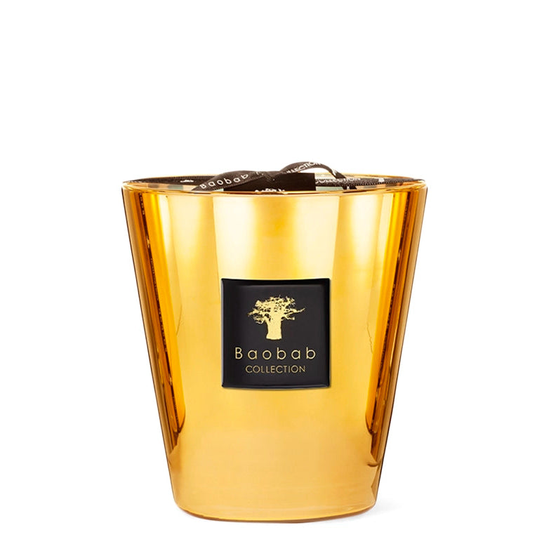 Gold candle with Baobab Collection logo on a white background