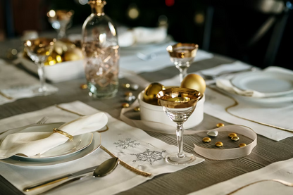 22 Maggio Istanbul Le Alpi  New Year Placemat Set of 4-Elegant table setting with gold and white decor on a dark background
