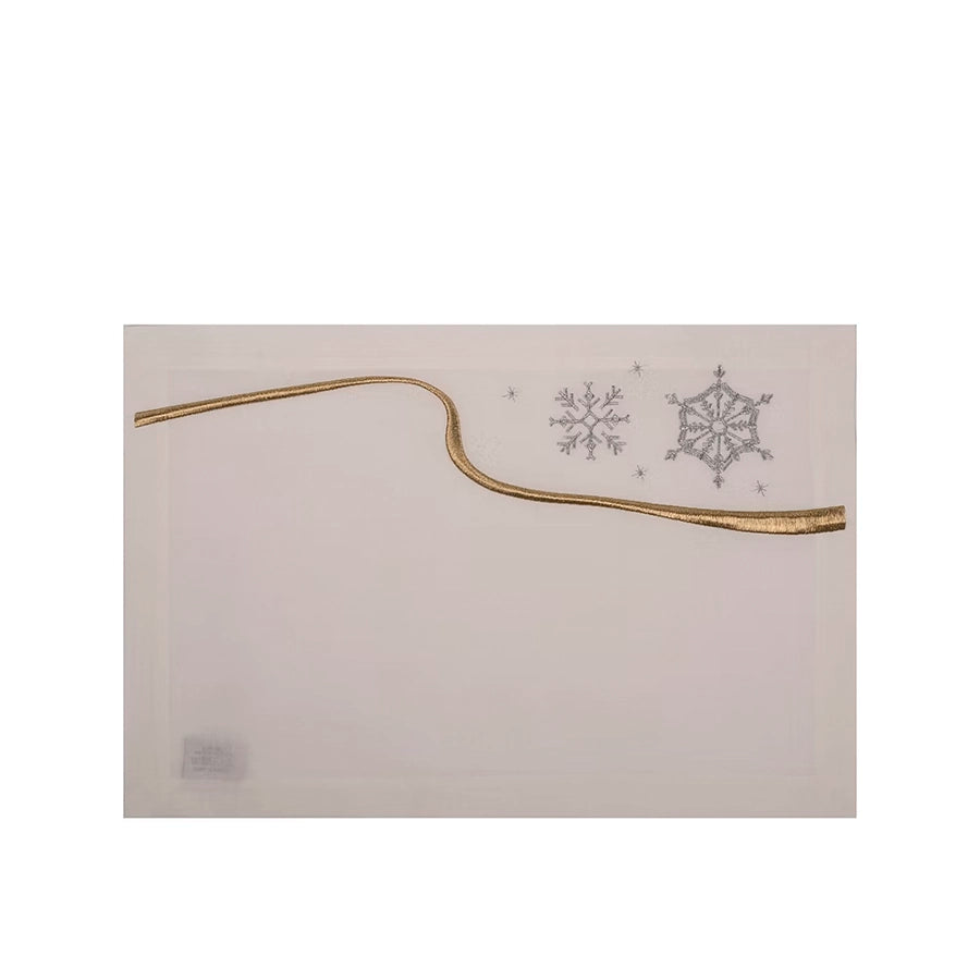 22 Maggio Istanbul Le Alpi  New Year Placemat Set of 4-Decorative card with gold arch and snowflake designs on a white background
