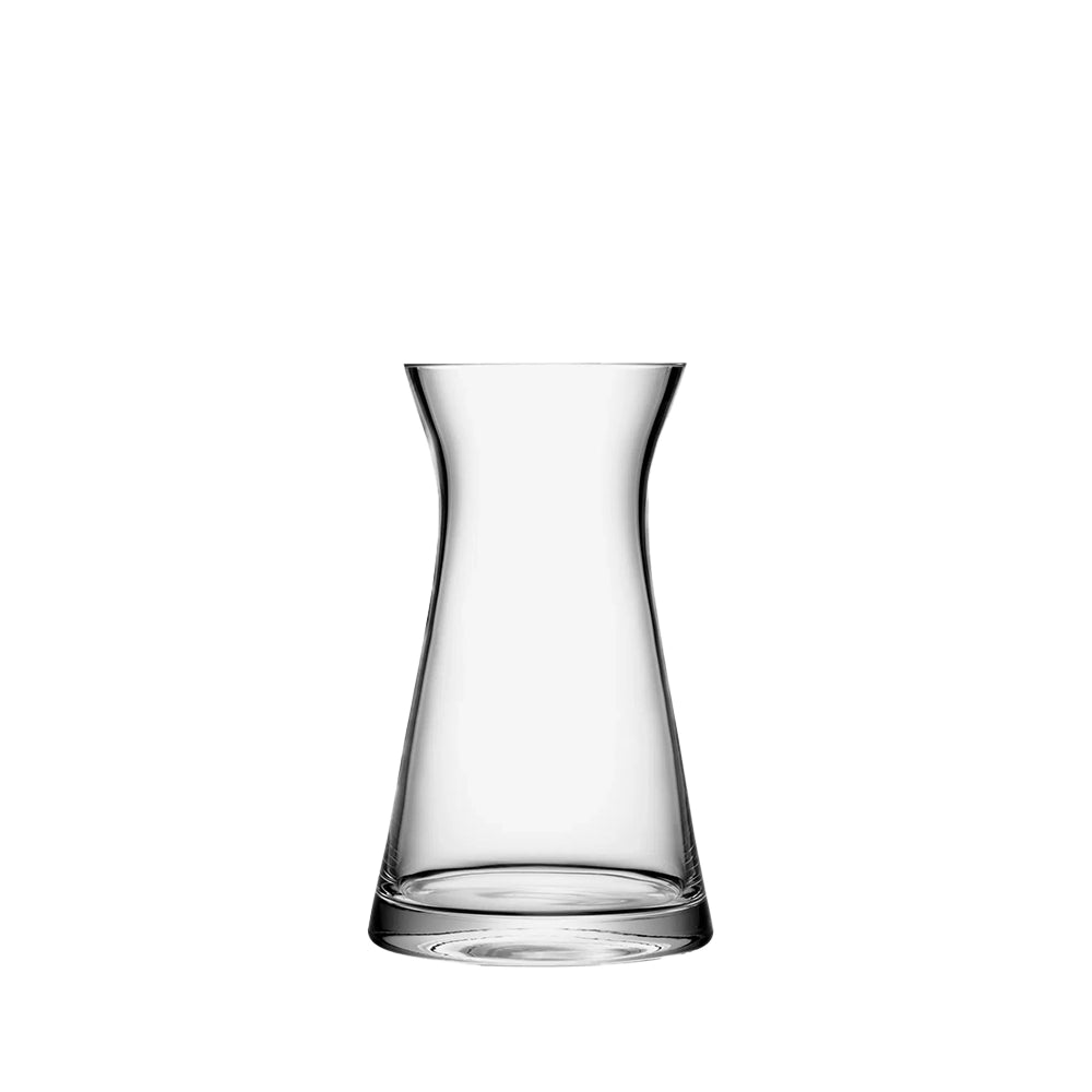 A clear glass vase with an hourglass silhouette, featuring a tapered waist, thick curved walls, and a flared neck.