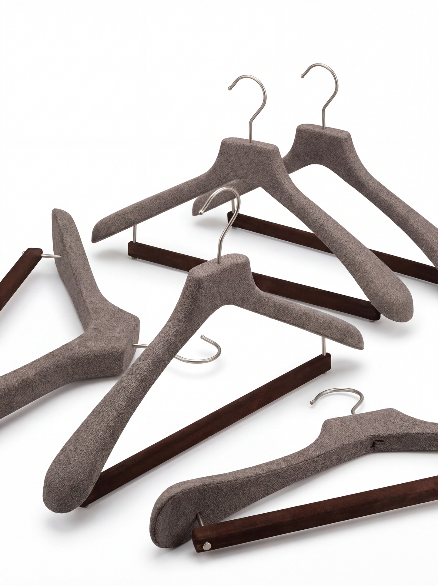 Hanger for suits with a velvet covered bar for trousers