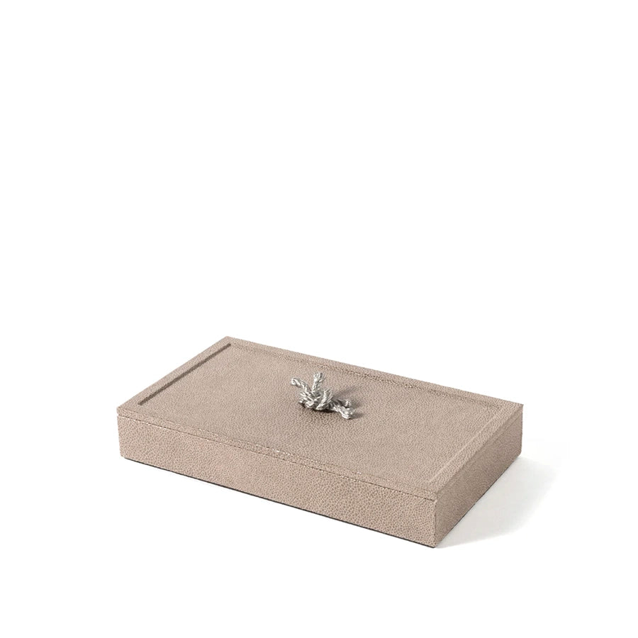 Beige jewelry box with a silver dragonfly on a white background