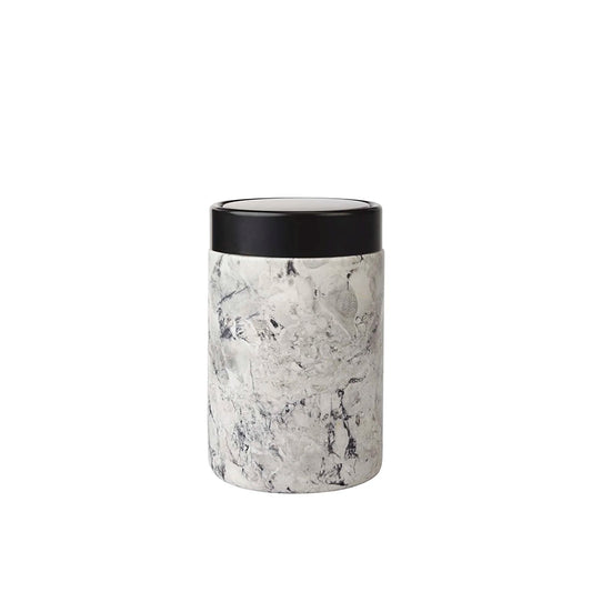 Aquanova Nero Cosmetic bin with swing lid-Marble-patterned tumbler with black lid on a white background