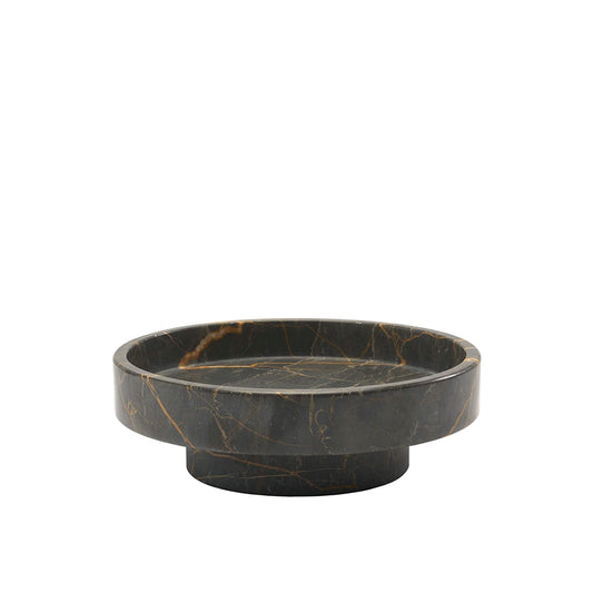 Black marble-patterned dish on a white background