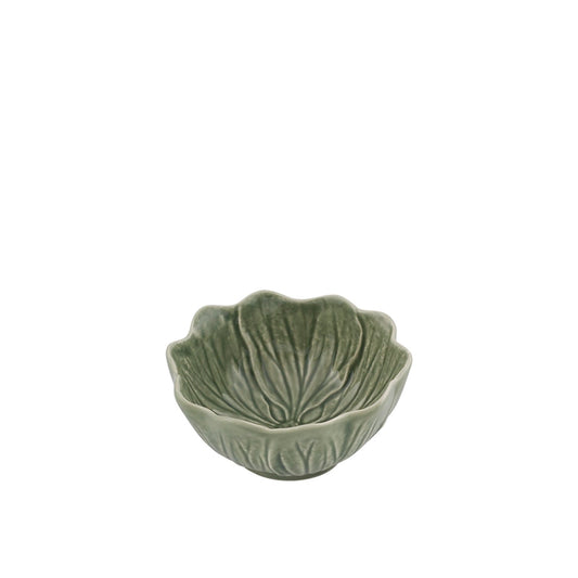 Green ceramic bowl with leaf design on a white background