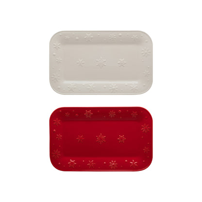 Bordallo Pinheiro Snowflakes Platter-Two rectangular trays, one beige and one red, with snowflake patterns on a white background.