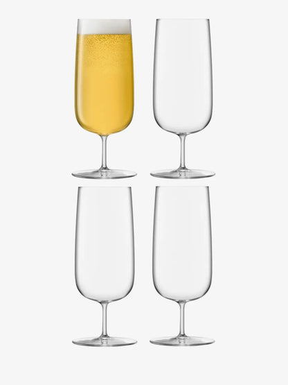 Borough Pilsner Glass for elegant beer serving-Two champagne flutes, one with champagne, on a white background.