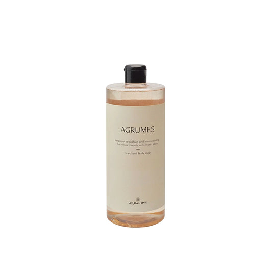 Bottle of Aquanova Agrumes hand and body wash on a white background